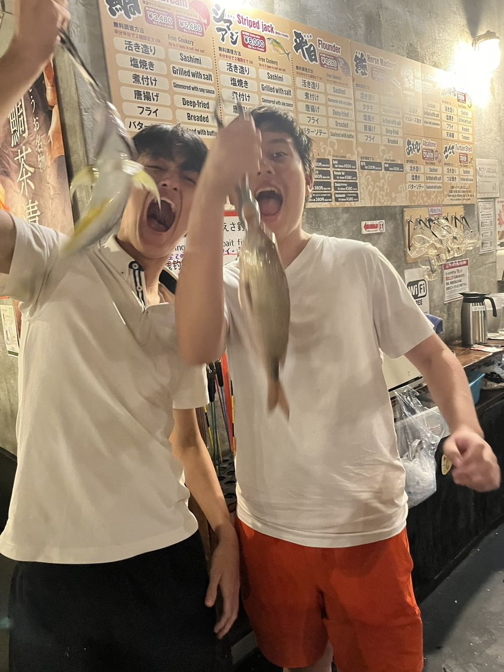 Catching dinner at a fishing izakaya
